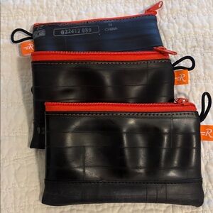 Set of three. Never used. Made from recycled bicycle tires. Approx 4x6 inches